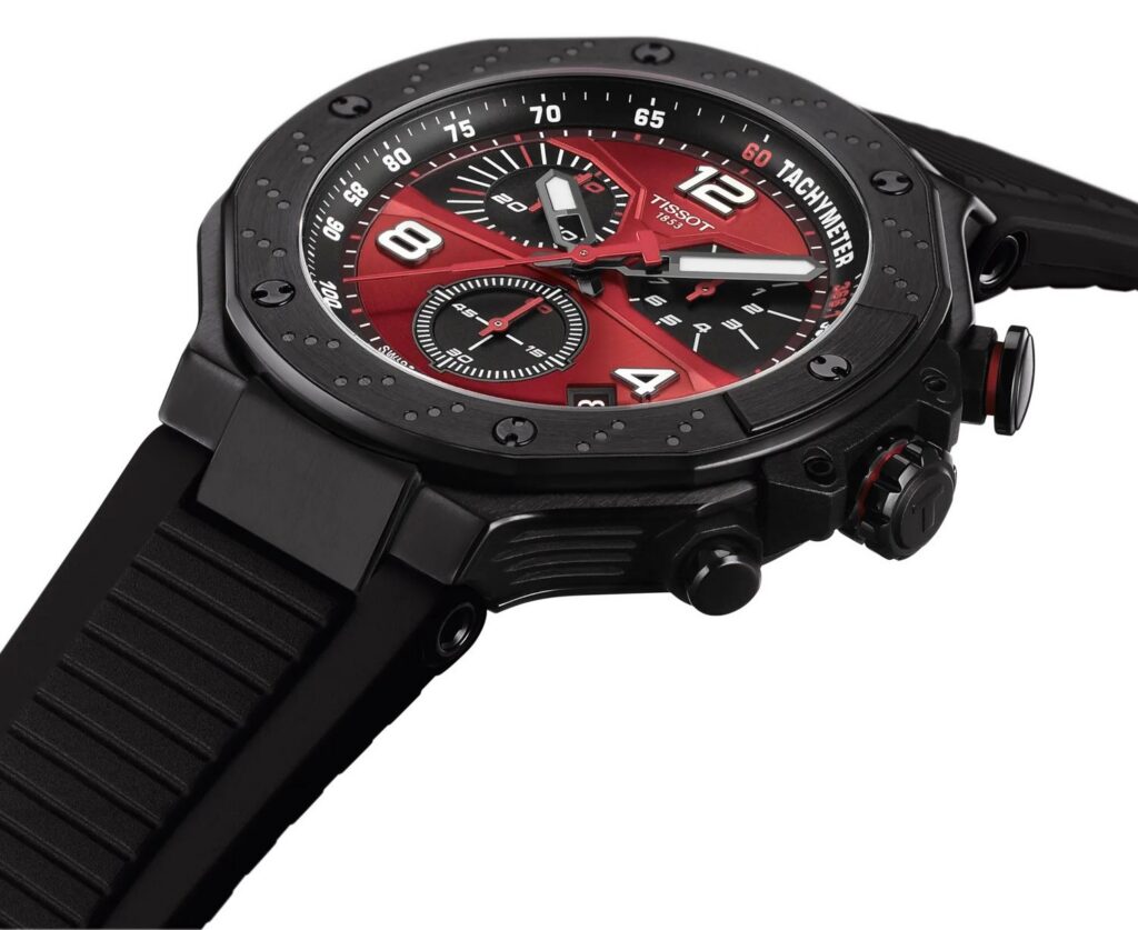 zbliżenie na koronki i na charakterystyczne nacięcia tarczy hamulcowej na bezelu w zegarku  Tissot T-Race Quartz Chronograph MotoGP Limited Edition T141.417.37.422.00